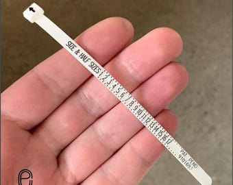 Plastic ring sizer, ring sizer chart, reusable ring sizer, ring sizer, adjustable ring sizer, plastic ring size finder