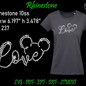 May include: Dark gray t-shirt with a rhinestone "Love" design, incorporating a Mickey Mouse head silhouette. The design is 6.197 inches wide and 3.478 inches high. The image also includes the text "Rhinestone" and "SVG-PDF-EPF-DXF-STUDIO".