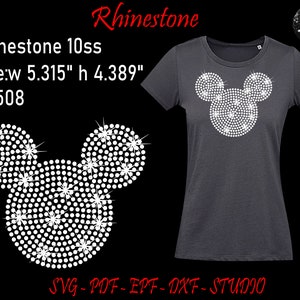 May include: Dark gray t-shirt featuring a rhinestone Mickey Mouse design. The design is made of white rhinestones and is 5.315 inches wide and 4.389 inches high. The text "Rhinestone" is at the top.