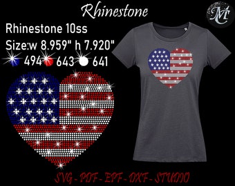 May include: Rhinestone design of an American flag in the shape of a heart. The design is 8.959 inches wide and 7.920 inches tall. The design is shown on a gray t-shirt.
