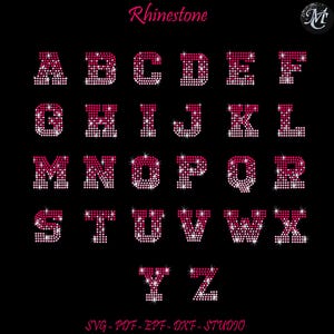 May include: A full alphabet in capital letters, each letter composed of small, pink rhinestones with sparkling highlights, set against a black background. The word "Rhinestone" is above the alphabet. Below the alphabet are the words "SVG-PDF-EPF-DXF-STUDIO".