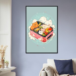 May include: A pink and white bento box with a cartoon illustration of cats and food. The box is surrounded by white clouds and a light blue background.
