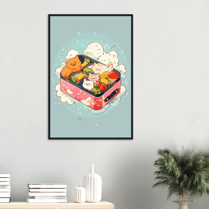 May include: A pink and white bento box with a cartoon illustration of cats and vegetables. The box is surrounded by white clouds and a light blue background.