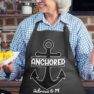 Anchored Christian Gray Apron | Hebrews 6:19 Scripture Apron with 5 Strap Colors | Faith Cooking Gift for Kitchen, BBQ, Baking, Holidays