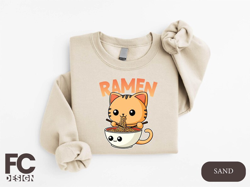 a t - shirt with a cat eating out of a bowl