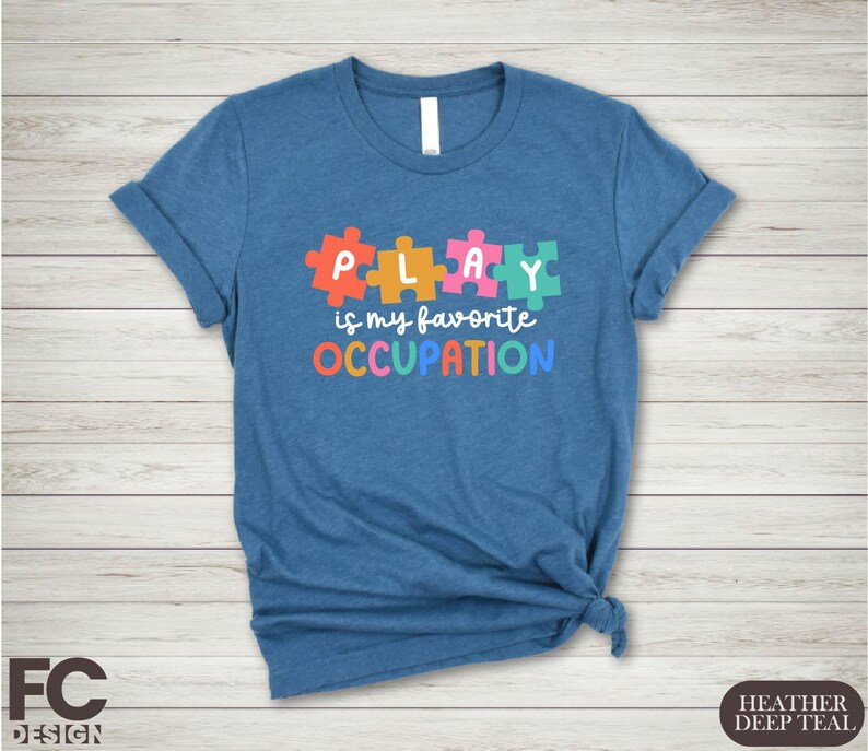 a t - shirt that says play is my favorite occupation