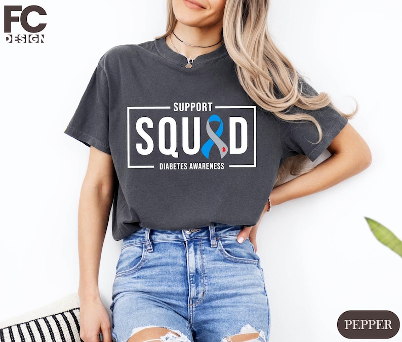 a woman wearing a t - shirt that says support squid