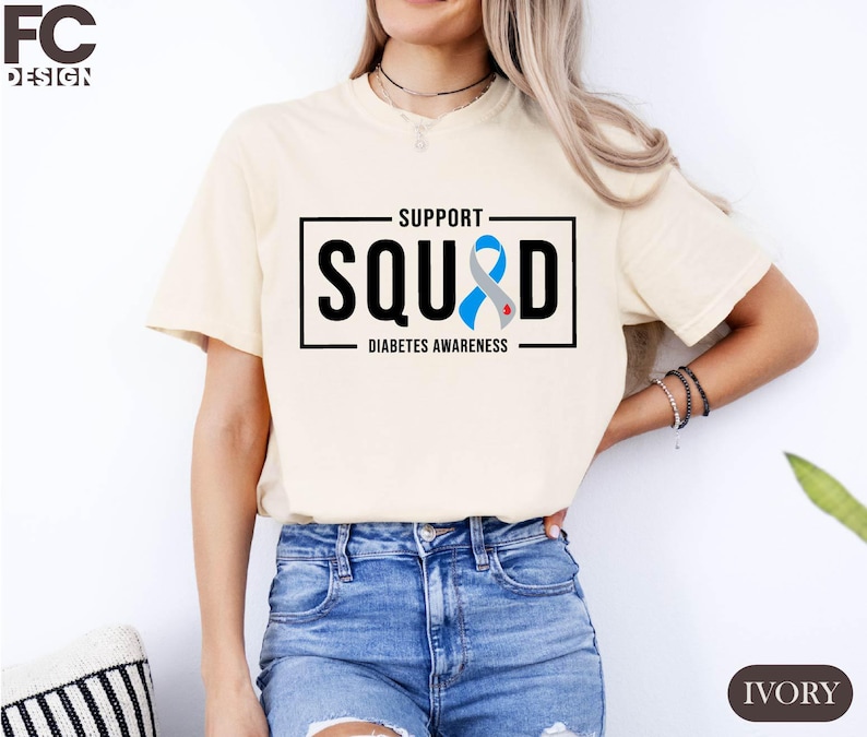 a woman wearing a t - shirt that says support squid