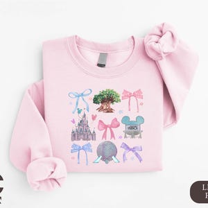 a pink shirt with a picture of a princess on it