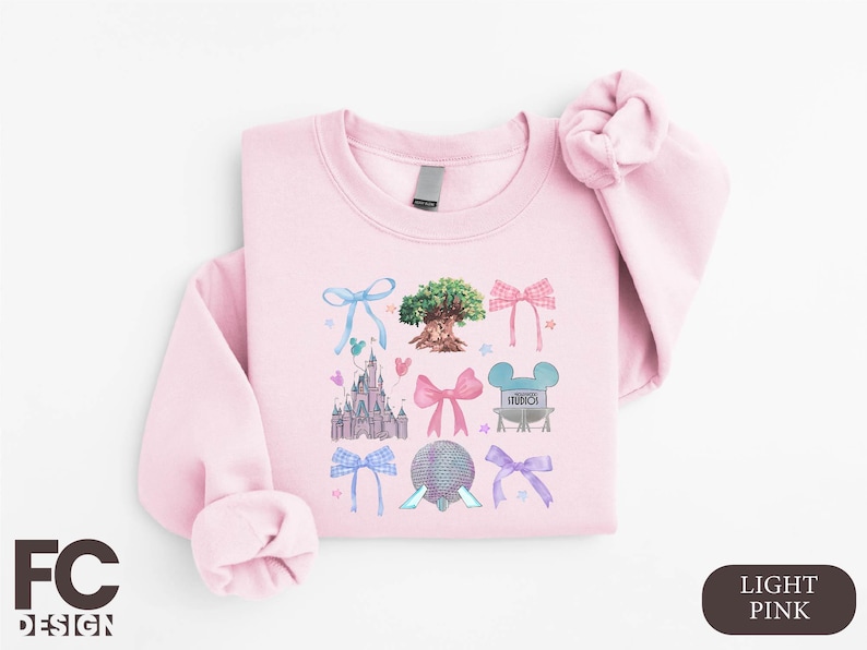 a pink shirt with a picture of a princess on it