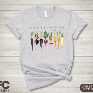 a t - shirt with a bunch of vegetables on it