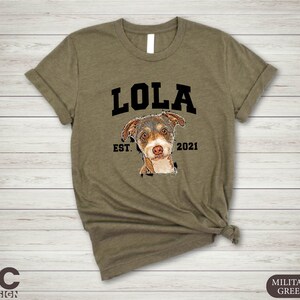 a t - shirt with a dog's face on it