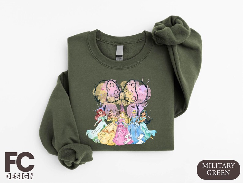 a green sweatshirt with a picture of a group of people on it