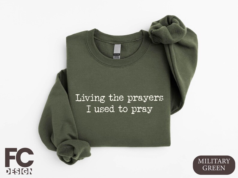 a t - shirt that says living the prayers i used to pray