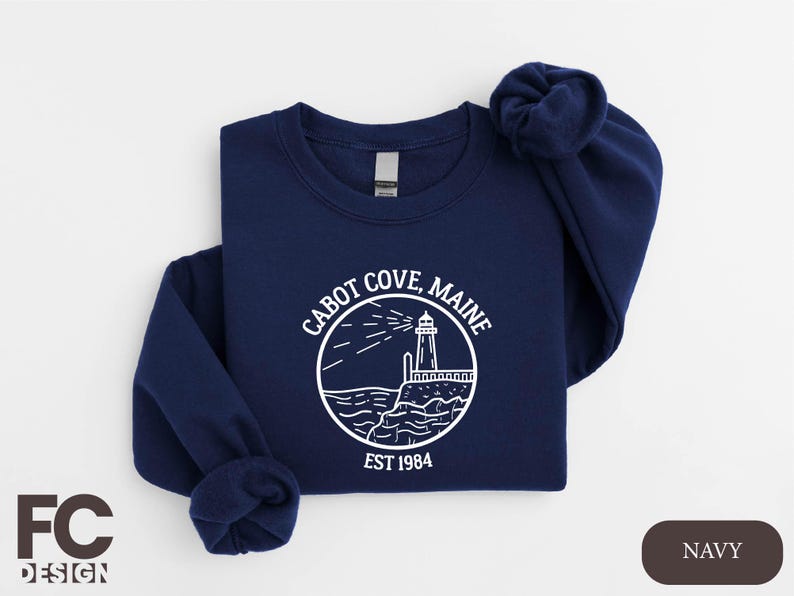 a navy sweatshirt with a lighthouse on it