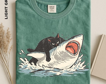 Fat Cat Vs Shark Shirt, Meme Hilarious Cat Riding Shark Funny Ocean Graphic Tee, Retro Animal Humorous Cute Kitten Comfort Colors Sweater