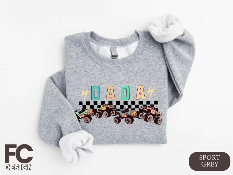 a gray shirt with a picture of a racing car on it