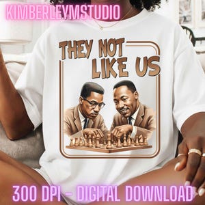 May include: White t-shirt featuring a graphic of two men playing chess, with the text "THEY NOT LIKE US" in brown. The image is a digital download.