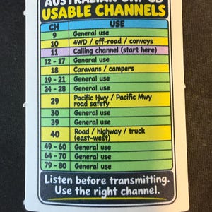 May include: A rectangular sticker titled Australian UHF CB Usable Channels. It features a color-coded table listing channel numbers and their specific uses, such as general use, 4WD, and road safety. The bottom text reads Listen before transmitting. Use the right channel.