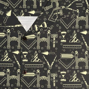 May include: Black button-down shirt with a repeating pattern of cream-colored Masonic symbols, including rulers, pillars, and compasses. The shirt has a white collar and a brown button closure.