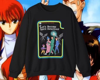 May include: Black crewneck sweatshirt with a colorful graphic featuring the text "Let's Become Spirit Detectives!" and cartoon characters. The design is framed in a yellow and blue border. The background features anime characters.