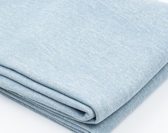 Gewassen denimstof, katoenen denimstof, zware denim, zachte denimstof, oud lichtblauwe denim, jeansstof, per halve meter