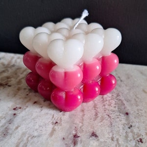 Handgjort tonat hjärtformat bubblaljus