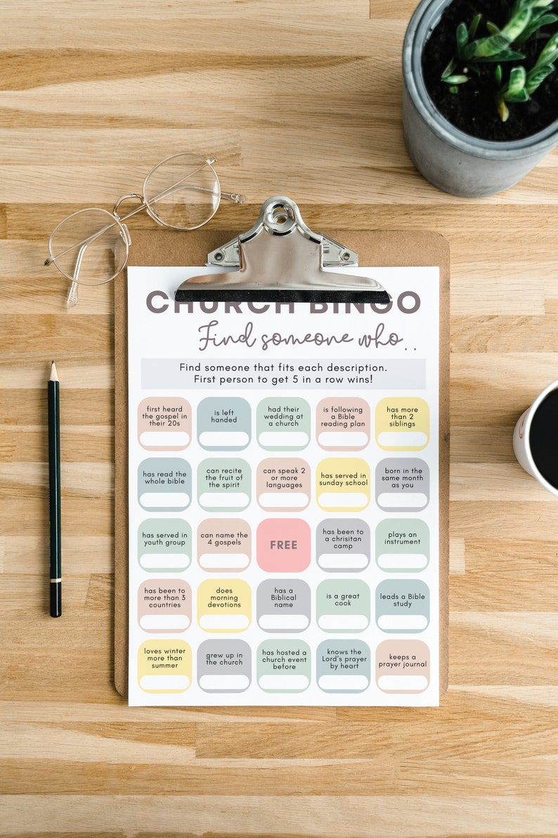 Christian Church bingo icebreaker game printed out and clipped to a clipboard