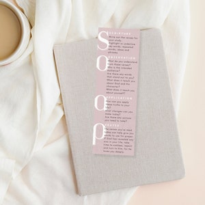 pink soap bible study bookmark on top of a journal