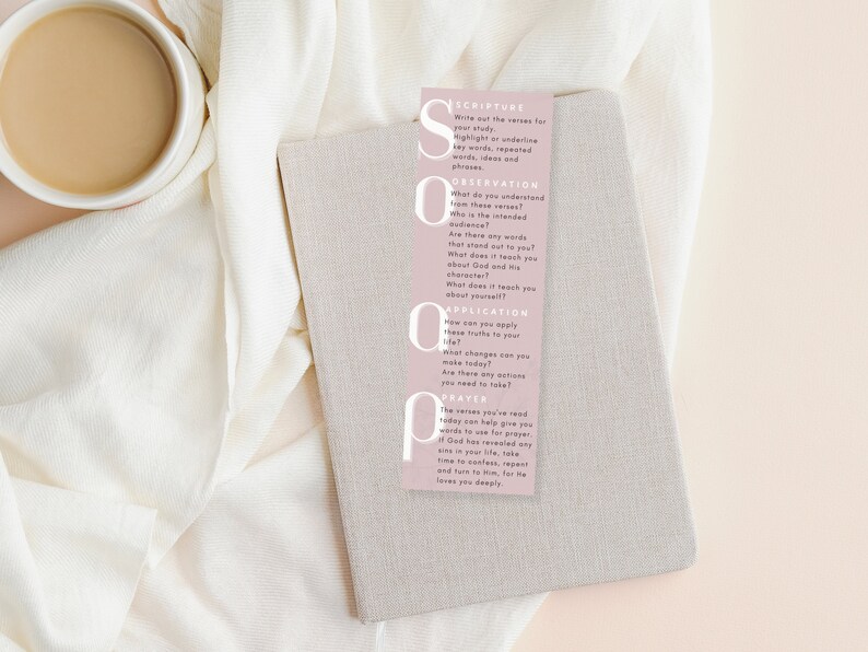 pink soap bible study bookmark on top of a journal