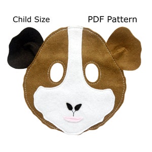 May include: A brown and white felt guinea pig mask with black ears and pink nose. The mask is designed for a child and has eye holes for visibility. The text "PDF Pattern" is printed above the mask.