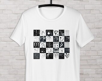 May include: White t-shirt with a black and white graphic print of abstract geometric shapes in a grid pattern.
