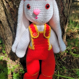 white and red rabbit soft toy