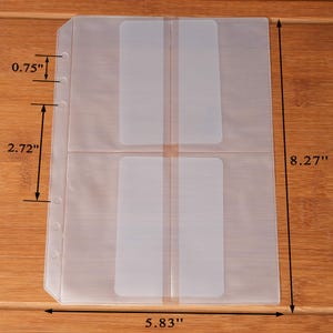 May include: Clear plastic card holder with four pockets, measuring 5.83 inches wide, 8.27 inches tall, and 0.75 inches for the hole spacing. The pockets are 2.72 inches apart. The holder is designed to store and protect cards.