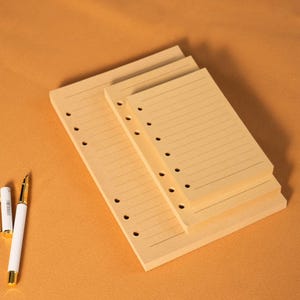 Refill till kraftpapperspärm, A5-kalenderinlägg, A6-anteckningsblock, A7 lösa blad, Linjerat anteckningsblad, 6 ringkalendersidor