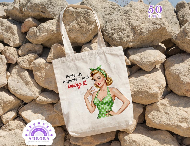 May include: Cream-colored tote bag featuring a retro illustration of a woman in a green polka-dot dress and matching headscarf. The bag has the text "Perfectly imperfect and loving it." The bag has long handles.