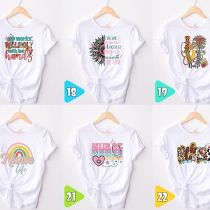 May include: Six white t-shirts with different designs featuring the word "Nurse". The designs include a rainbow, a stethoscope, a sunflower, and a heart.