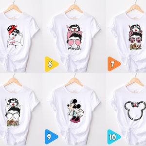 May include: Ten different designs of white t-shirts with various nurse-themed graphics. The designs include a strong woman with the text "I'm a Nurse", a woman with sunglasses and the text "#NurseLife", a woman with a stethoscope and the text "Nurse", a woman with sunglasses and the text "Nurse", a Mickey Mouse character wearing a doctor's coat and stethoscope, and a Mickey Mouse outline with a nurse's hat.