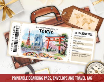 May include: A rectangular boarding pass featuring a watercolor illustration of Tokyo landmarks including Tokyo Tower and a torii gate. The text reads Surprise! You're going to TOKYO, HAPPY BIRTHDAY, and BOARDING PASS, with fields for passenger name, departure, return, and a personal message.