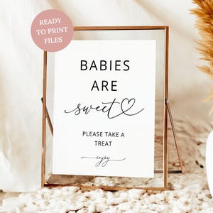 May include: A rectangular copper-toned metal frame holds a white sign with black text that reads BABIES ARE sweet, PLEASE TAKE A TREAT, and enjoy. A circular pink badge in the upper left corner contains the text READY TO PRINT FILES.
