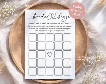 May include: A white rectangular bridal bingo game card with black text and a grid of twenty-five squares. The header reads bridal bingo with a heart icon. The instructions ask what will the bride-to-be receive and explain the rules.