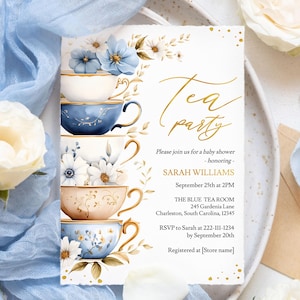 May include: A white invitation with gold lettering for a baby shower tea party. The invitation features a watercolor illustration of stacked teacups with blue and white floral designs. The text reads "Tea Party" and includes the name "Sarah Williams", the date and time of the event, the location, and RSVP information.