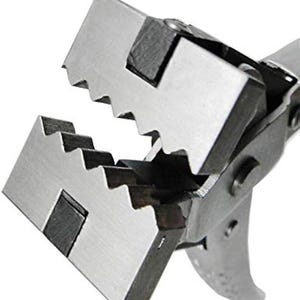 May include: Close-up of a silver metal crimping tool with a serrated jaw. The tool is designed for crimping electrical connectors.