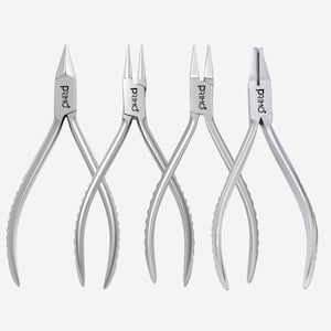 May include: Four silver pliers, each branded with "PRIMO". The tools have varied head designs: pointed, round, and flat. These pliers are likely intended for crafting or repair work. The handles have a curved design for grip.