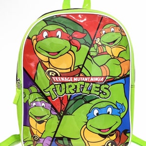 Op de afbeelding: Groene Teenage Mutant Ninja Turtles rugzak met een kleurrijke afbeelding van de vier schildpadden. De rugzak heeft een ritssluiting en verstelbare schouderbanden.