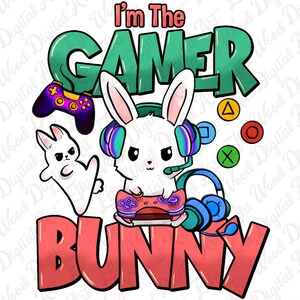 May include: A cartoon bunny wearing a headset and holding a video game controller. The bunny is surrounded by colorful game controller buttons and the text "I'm The Gamer Bunny".