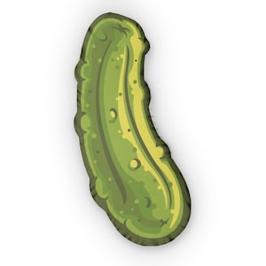 May include: A green pickle-shaped cushion with a cartoon design. The cushion has a light green base colour with darker green and yellow accents, and a textured appearance. The design includes details like bumps and spots, resembling a real pickle.