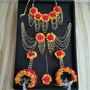 floral Yellow pink jewelry for haldi, mehendi and mayoon   Yellow floral haldi jewelry   Pink floral jewelry   Orange Floral jewelry