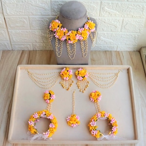 yellow haldi floral jewelry   yellow babypink floral jewelry   bridal floral jewelry