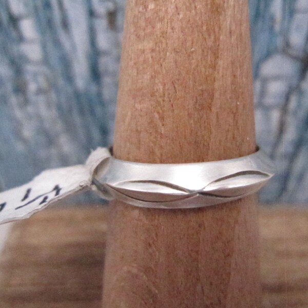 Carinated Stamped Sterling Silver Native American Made Band Rings sizes 7 1/4, 7 1/2, 8, and 8 1/2 by Robert Cadman.